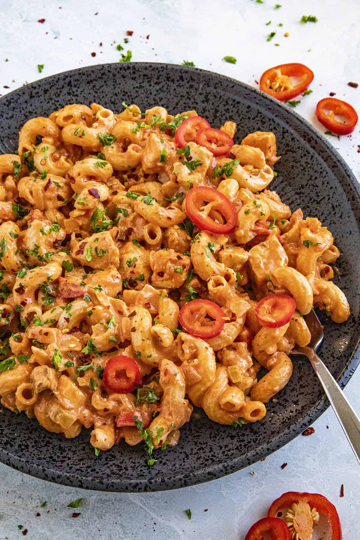 Creamy Cajun Chicken Pasta on a plate with garnish