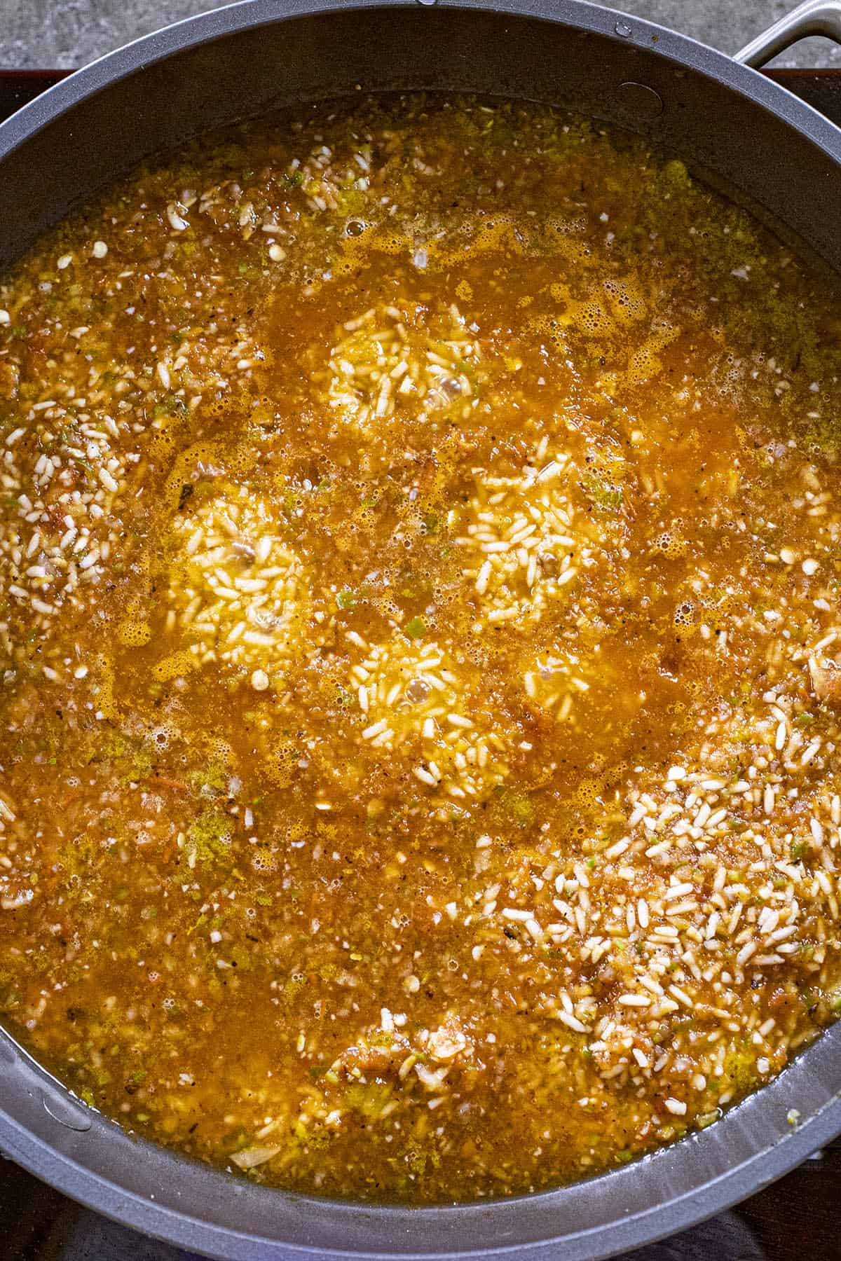 Simmering the Mexican Rice in a pan