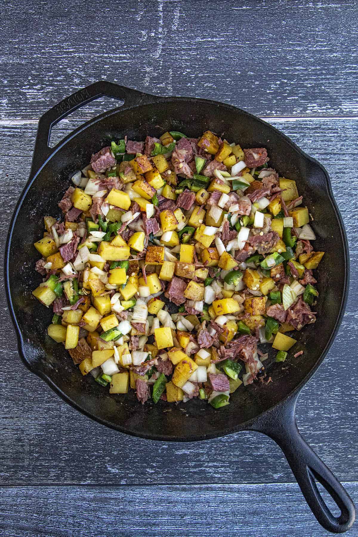 Corned Beef Hash ready to cook in a hot pan
