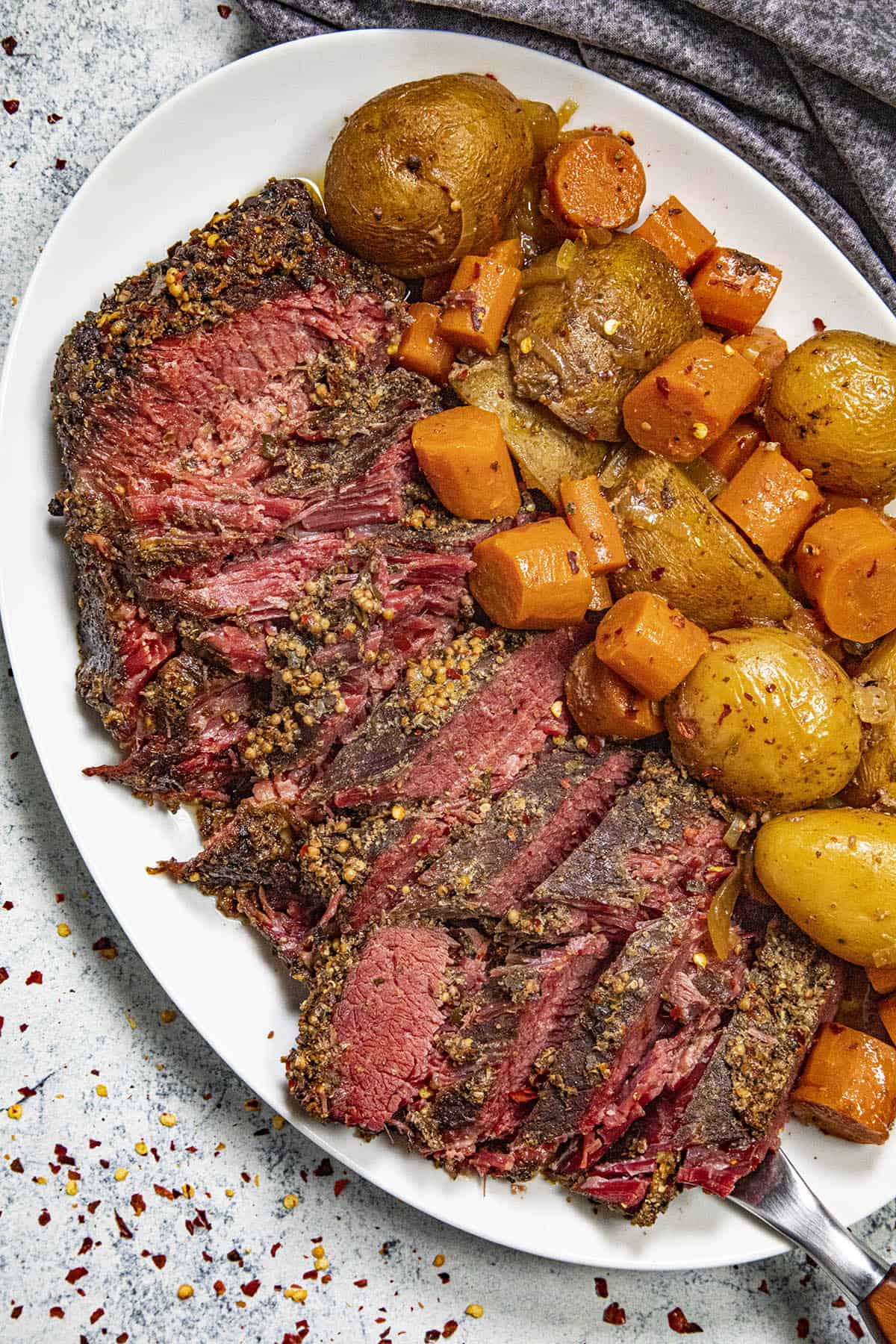 Fall apart tender crock pot corned beef ready to serve