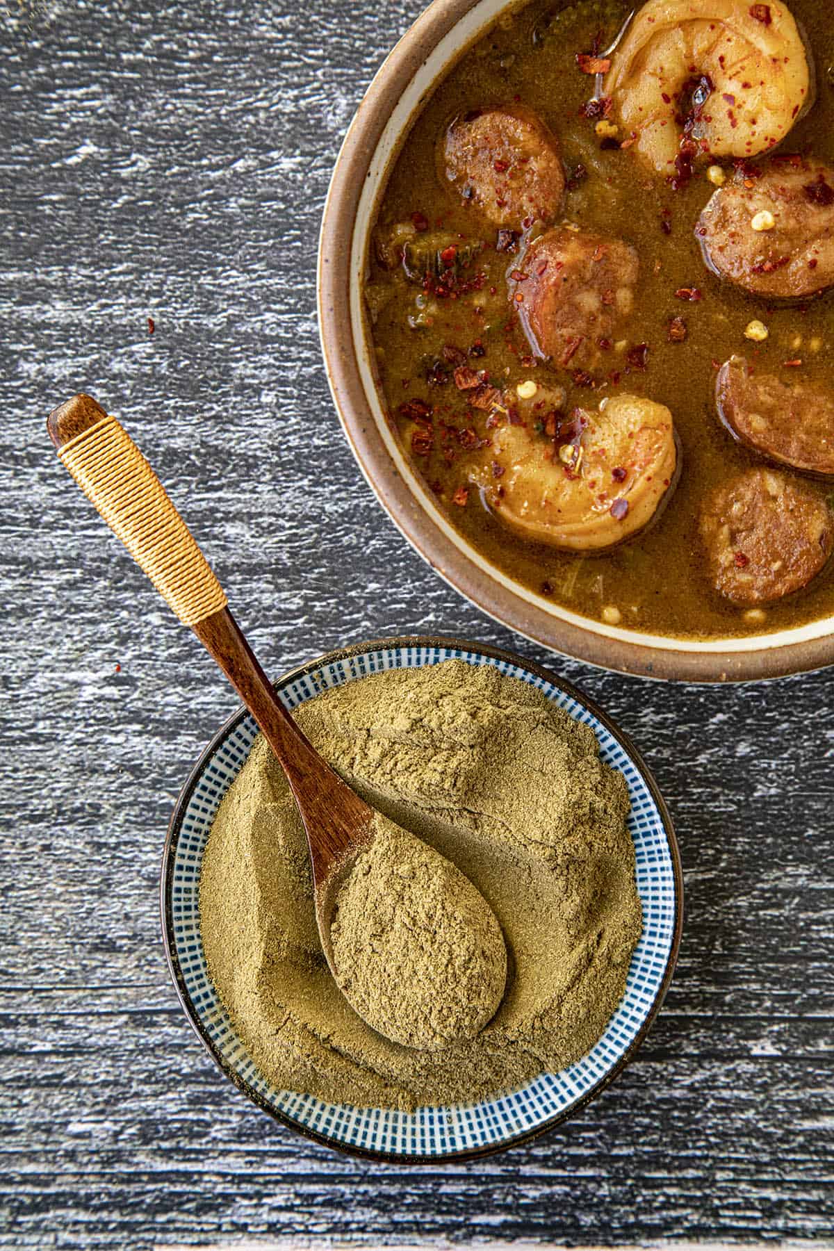 Gumbo File Powder with a bowl of gumbo
