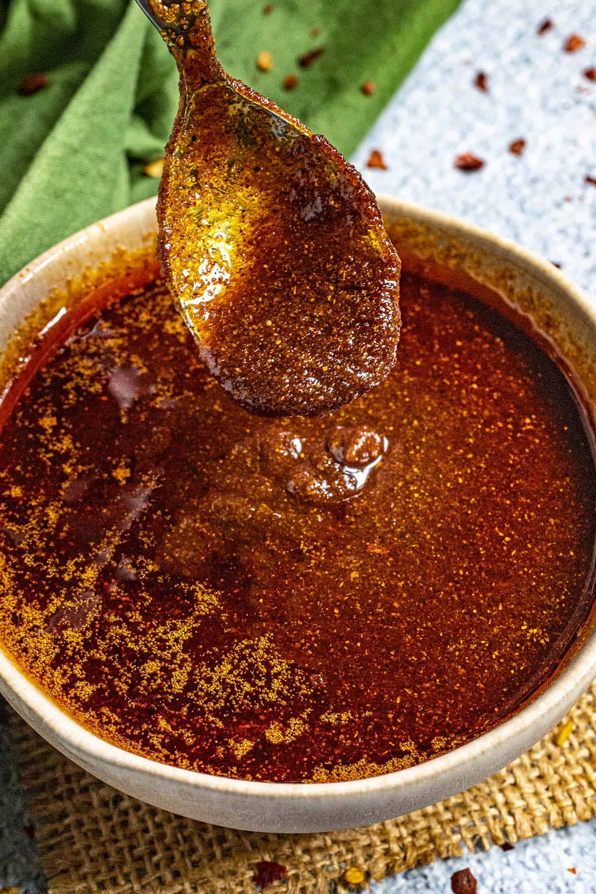 Nashville Hot Sauce dripping from a spoon