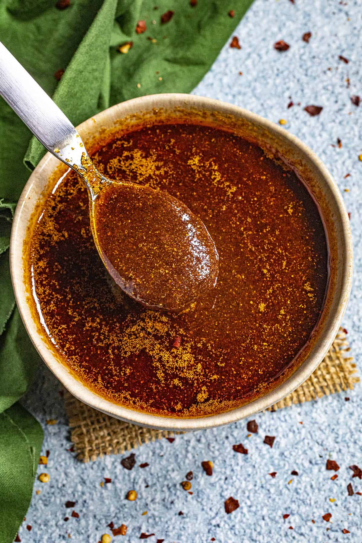 Thick and spicy Nashville Hot Sauce on a spoon