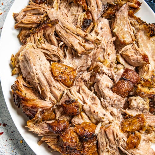 Puerto Rican Roast Pork on a plate (Pulled Pernil)