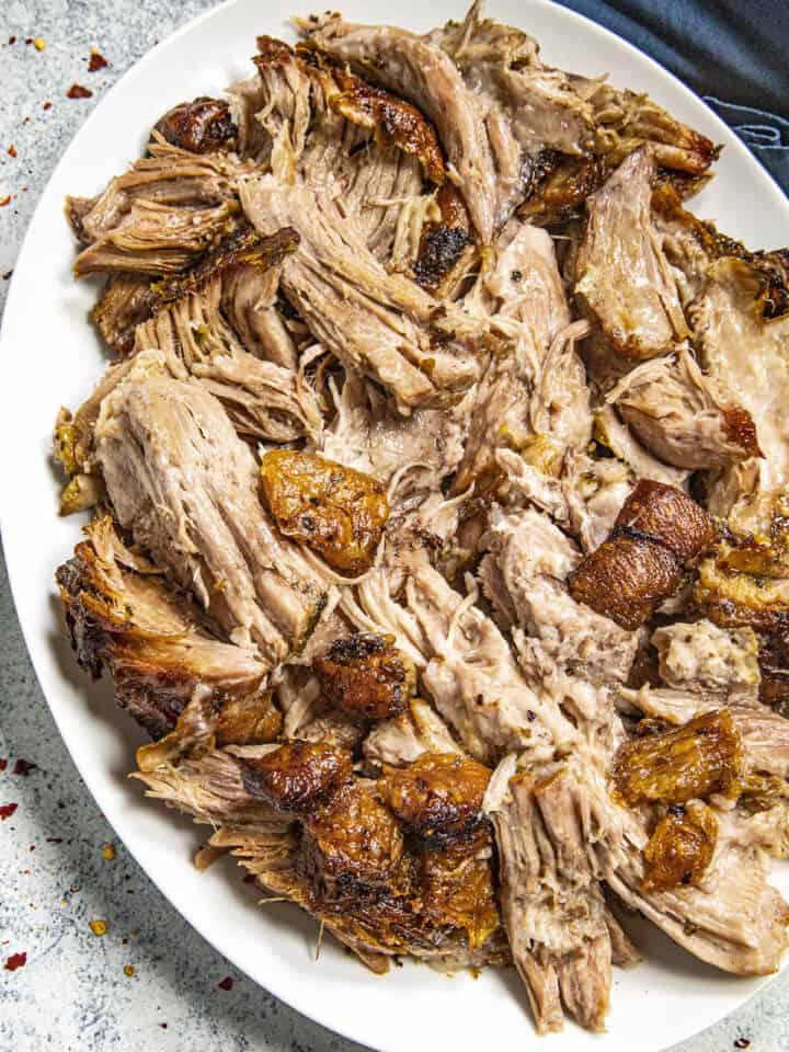 Puerto Rican Roast Pork on a plate (Pulled Pernil)