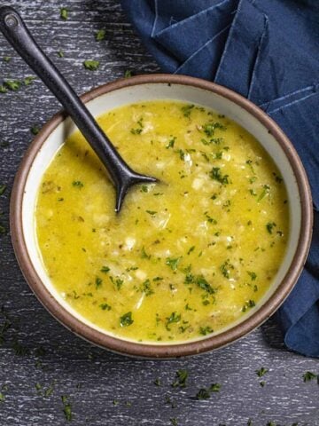 Cuban Mojo Marinade in a bowl with a spoon