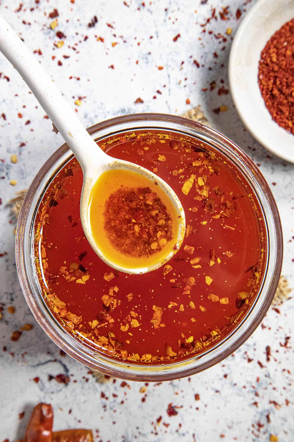 Homemade chili oil on a spoon