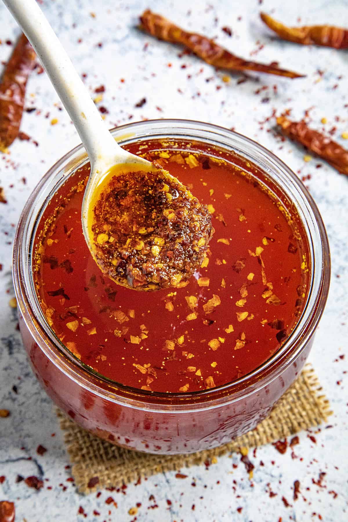 The thick sludge of chili flakes and spices from the bottom of the homemade chili oil jar