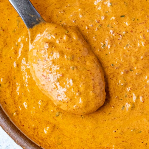 Creamy Chipotle Sauce on a serving spoon