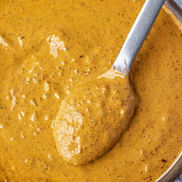 Scooping creamy Chipotle Sauce