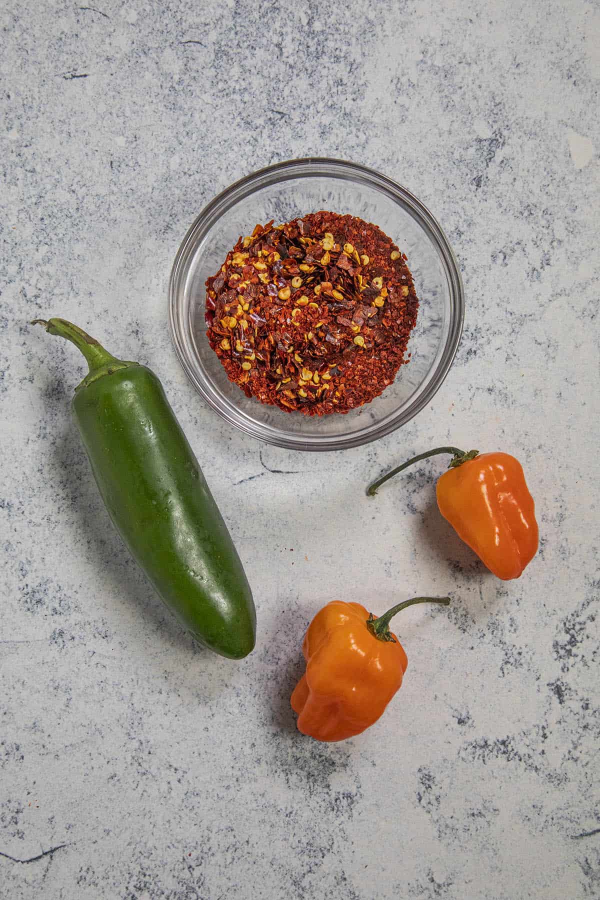 Fresh and dried hot peppers for making Hot Honey