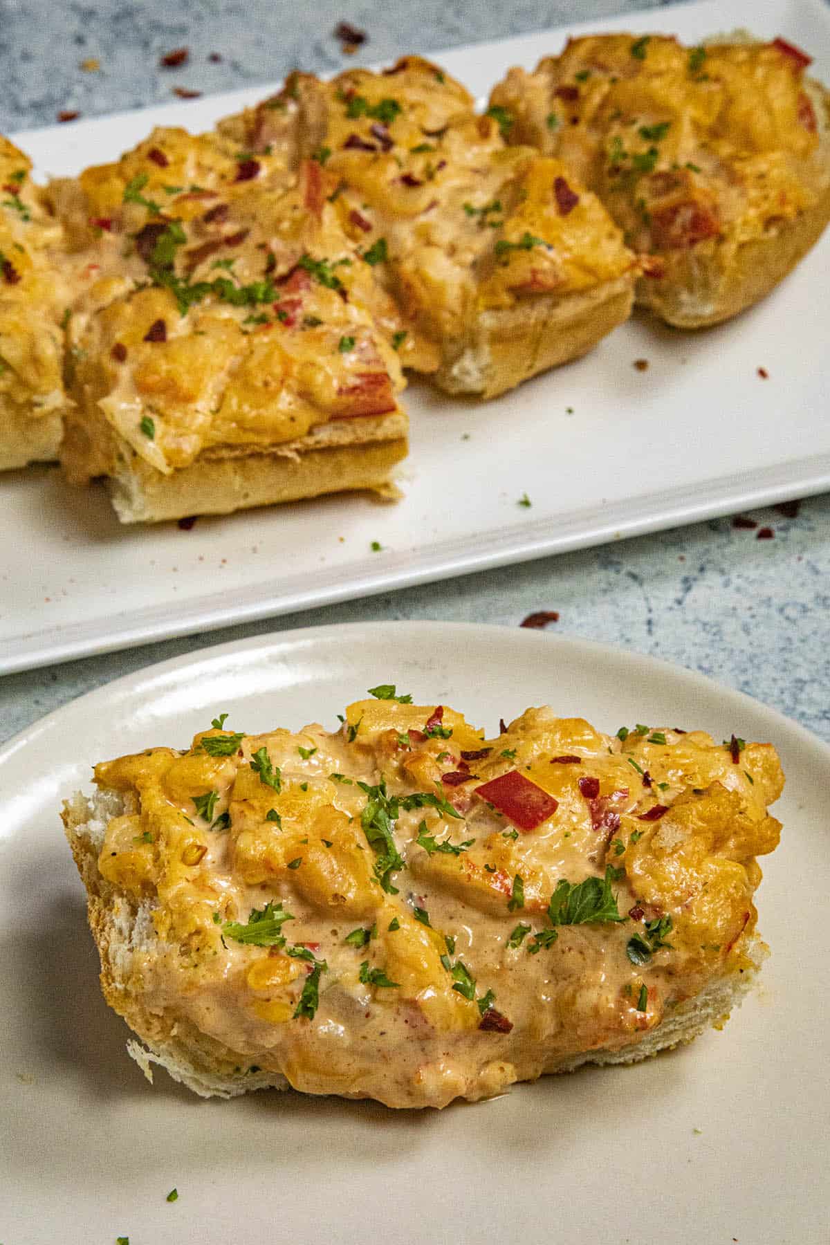 A piece of Crawfish Bread on a plate