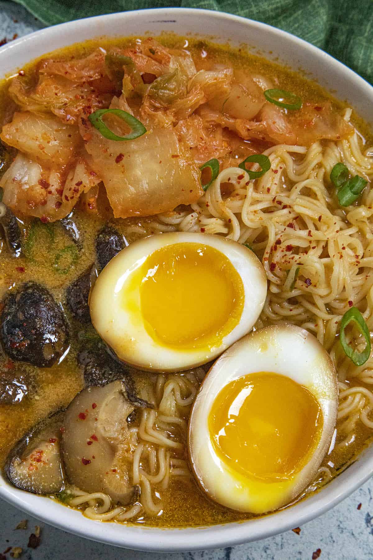 Jammy ramen eggs in a bowl of ramen noodles