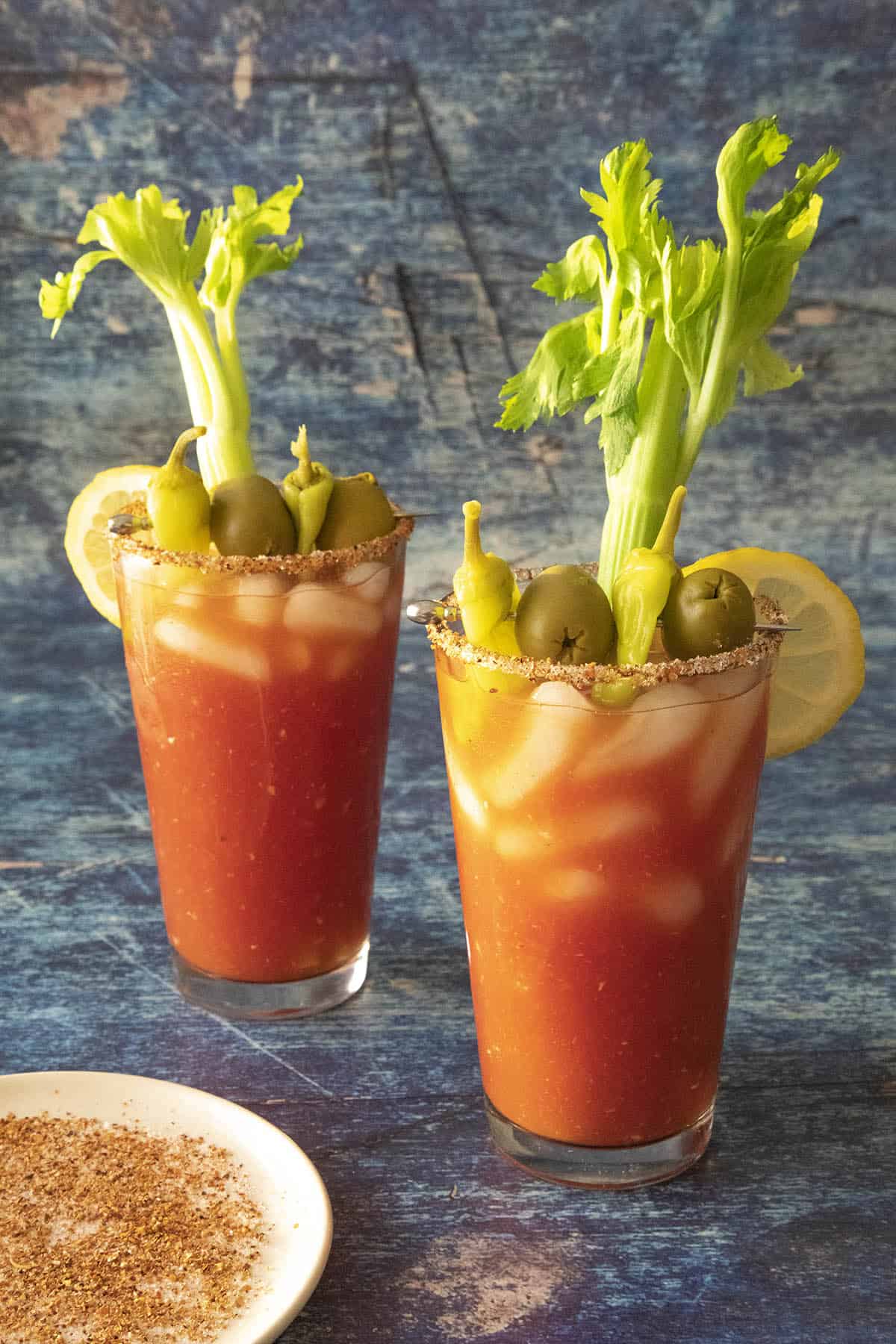 Two glasses of Spicy Blood Mary with garnish