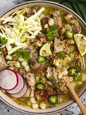 Mexican Pozole Verde in a bowl with lots of pork