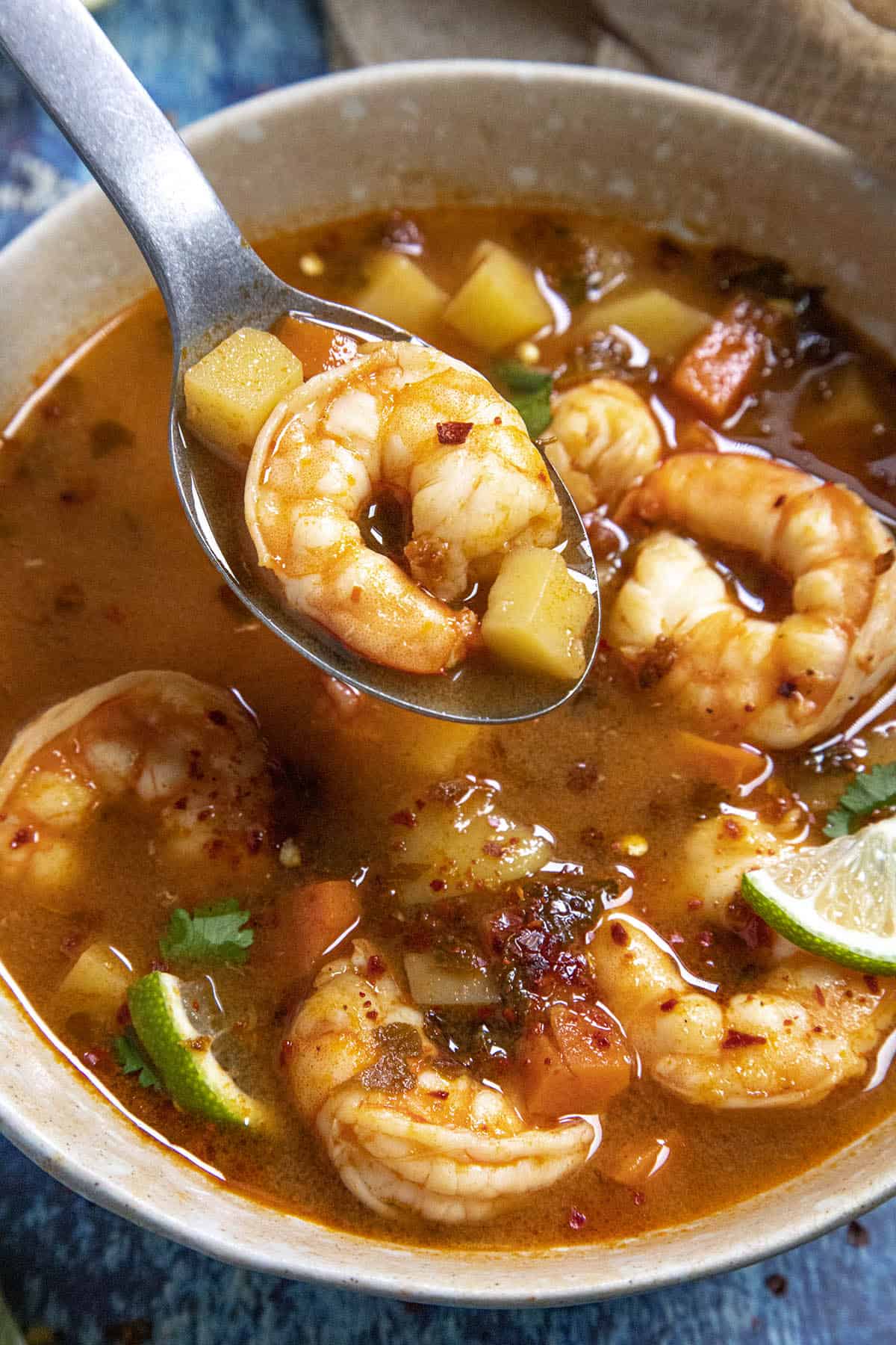 Mexican Shrimp Soup (Caldo de Camaron) on a spoon