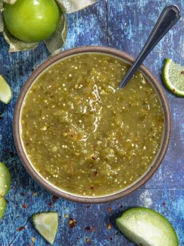 Green Enchilada Sauce in a bowl with a spoon