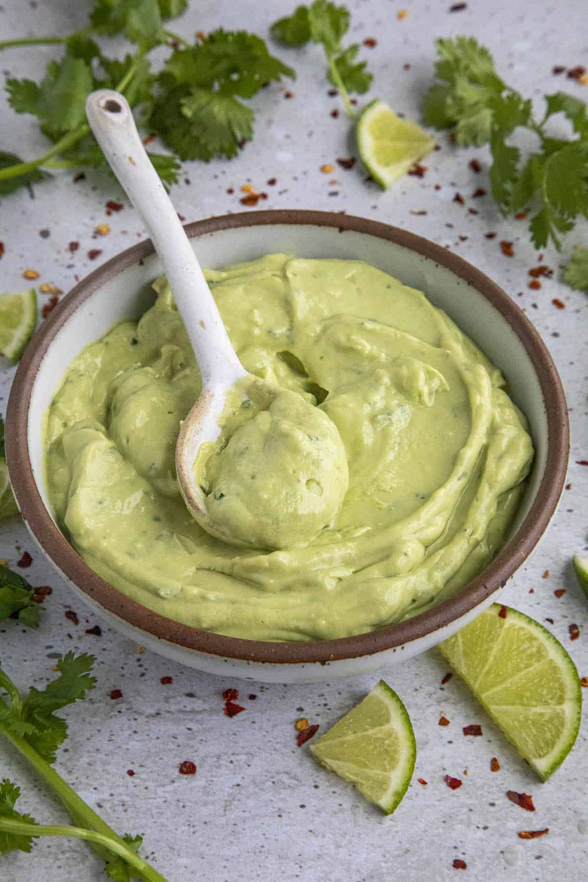 Avocado Crema in a bowl with a spoon