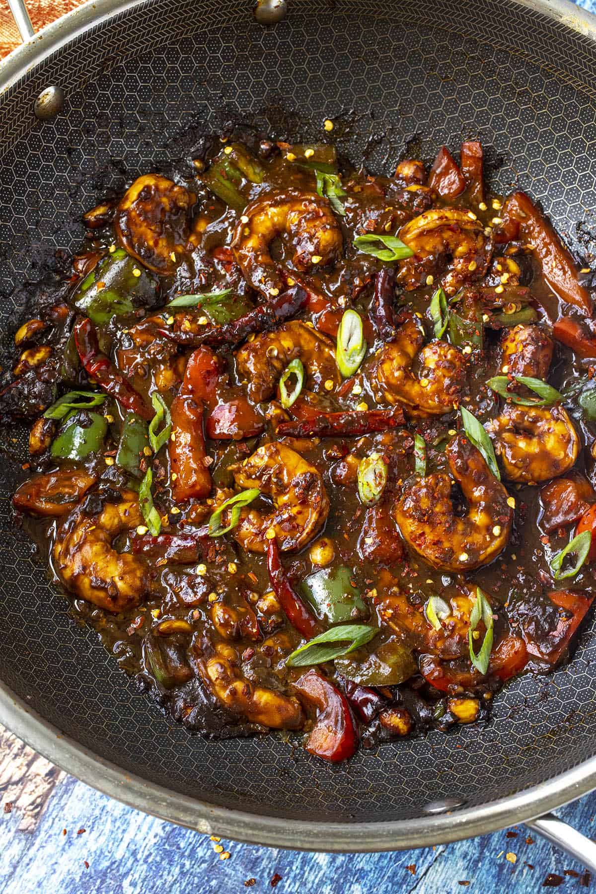 Kung Pao Shrimp in a wok with lots of sauce