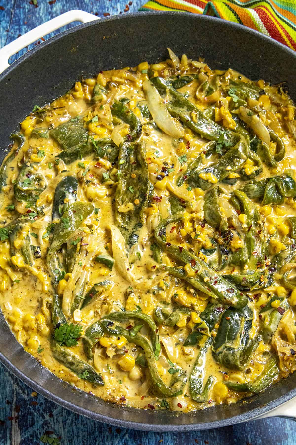 Creamy Rajas Poblanas in a pan, ready to serve