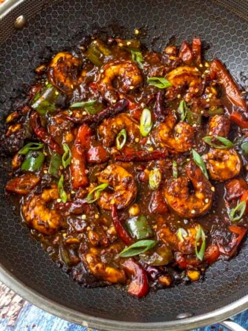 Kung Pao Shrimp in a wok with lots of sauce