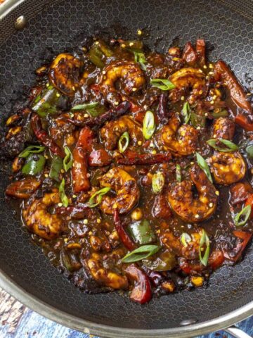 Kung Pao Shrimp in a wok with lots of sauce