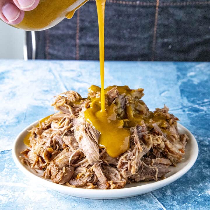 Carolina Gold Mustard BBQ Sauce poured over tender pulled pork