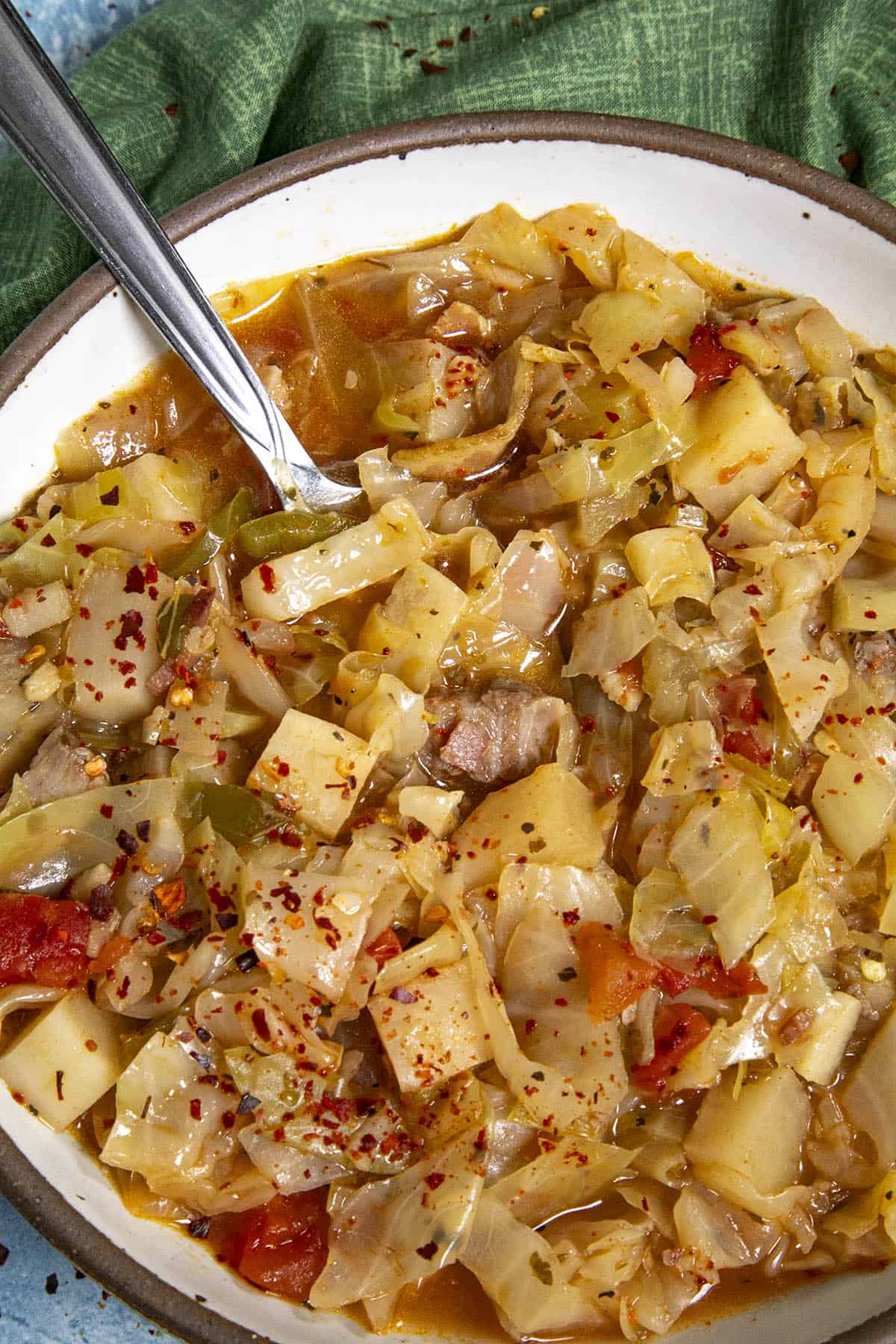 Cabbage Soup in a bowl with a spoon