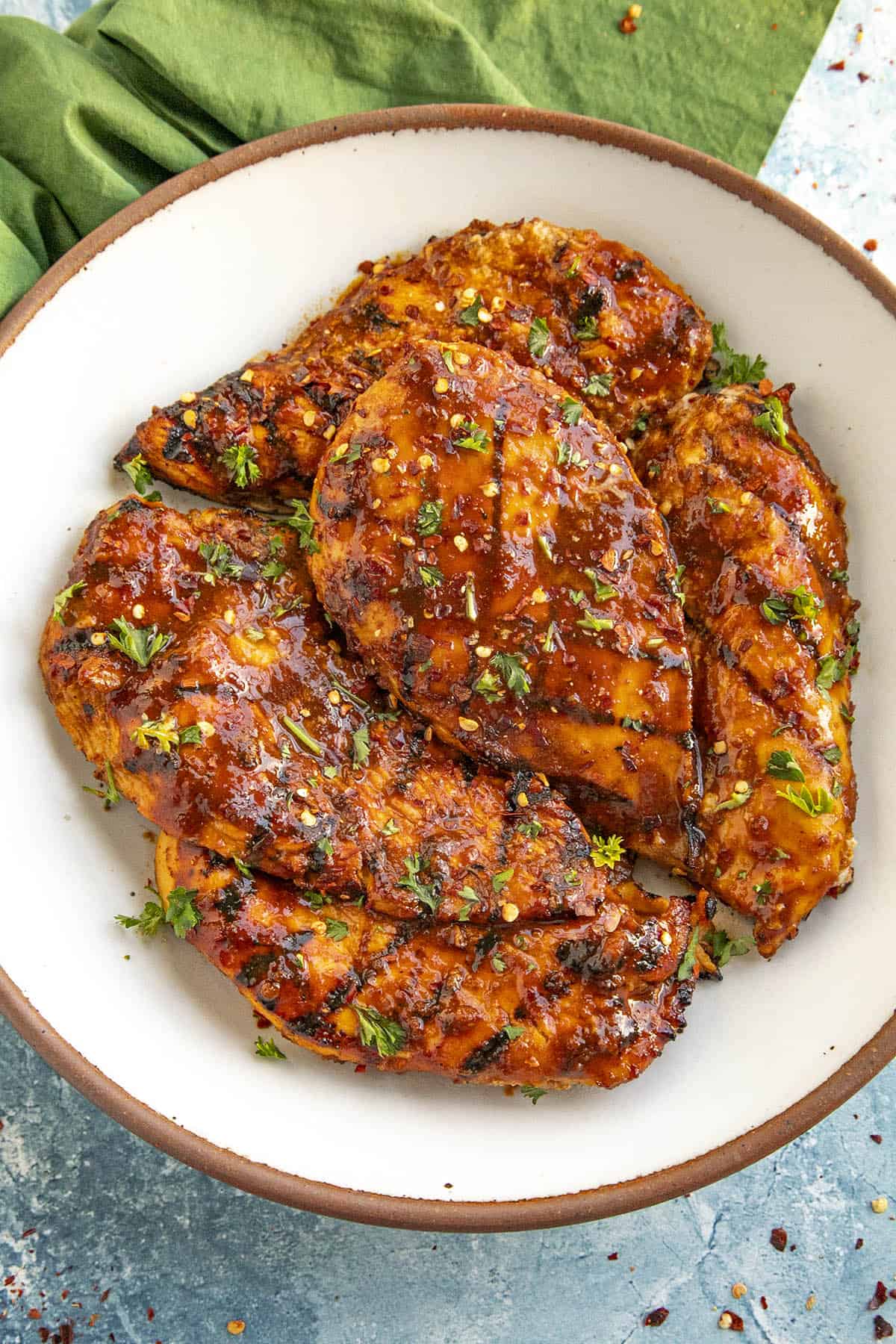 Honey Sriracha Chicken piled on a plate