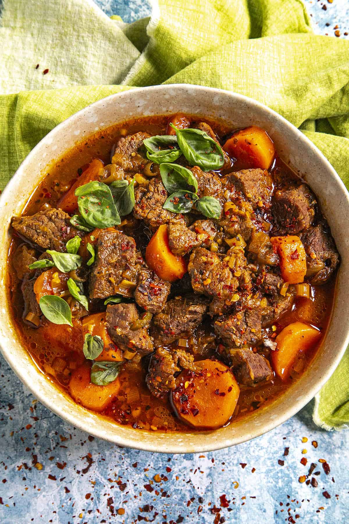 Spicy Vietnamese Beef Stew (Bo Kho) in a bowl with garnish