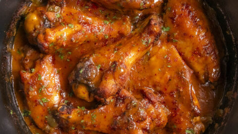 https://www.chilipeppermadness.com/wp-content/uploads/2023/10/Smothered-Turkey-Wings-Recipe-SQ-480x270.jpg