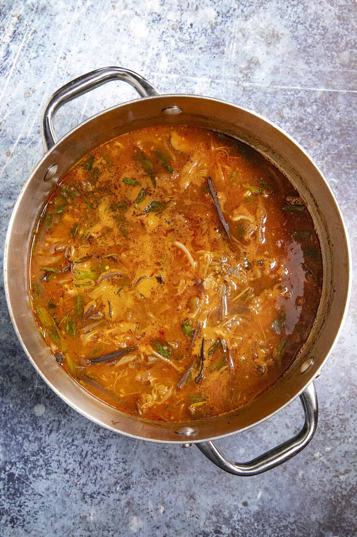 Yukgaejang simmering in a pot (Spicy Korean Vegetable Beef Soup)