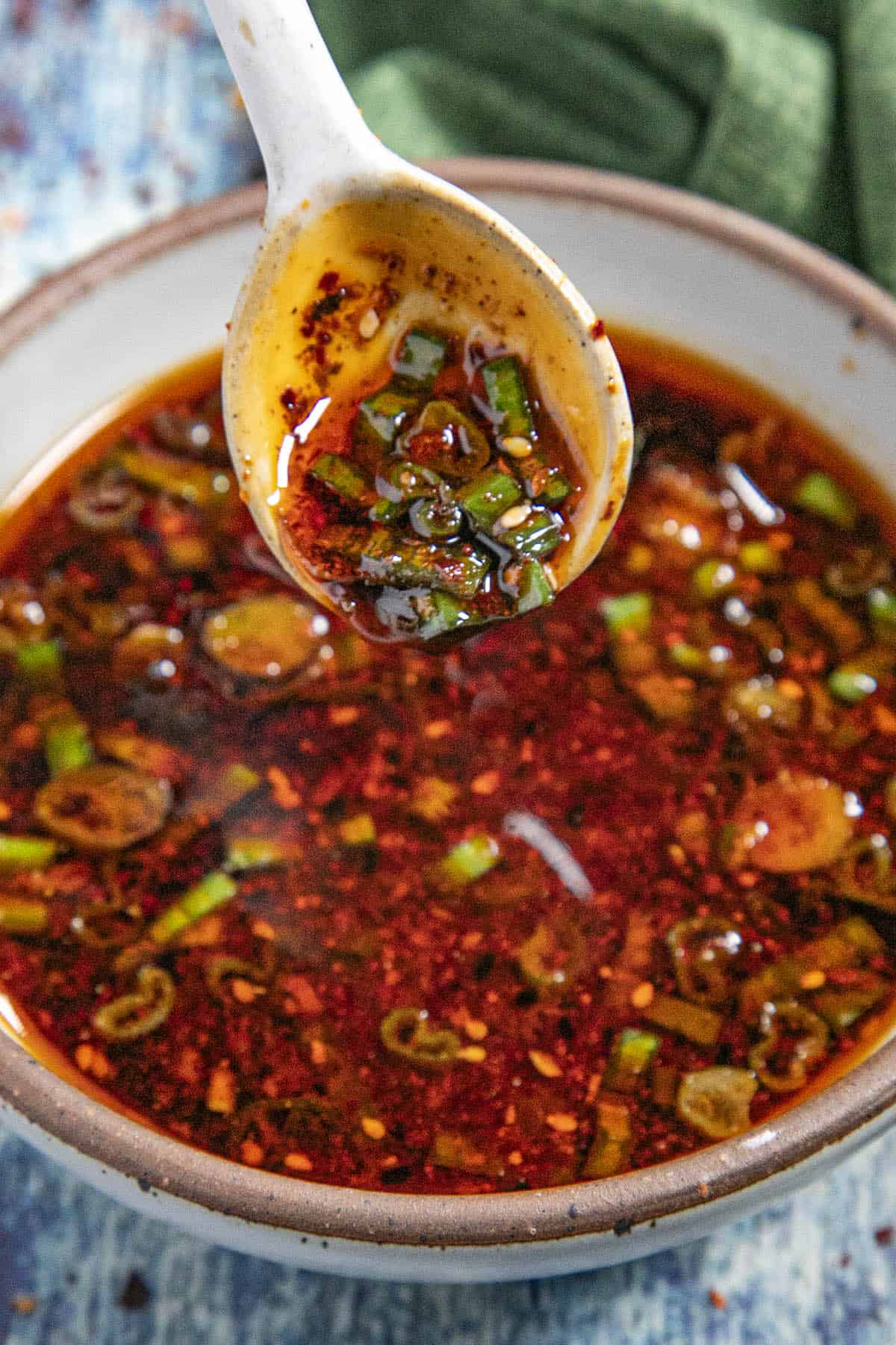 Gyoza Sauce dripping from a spoon