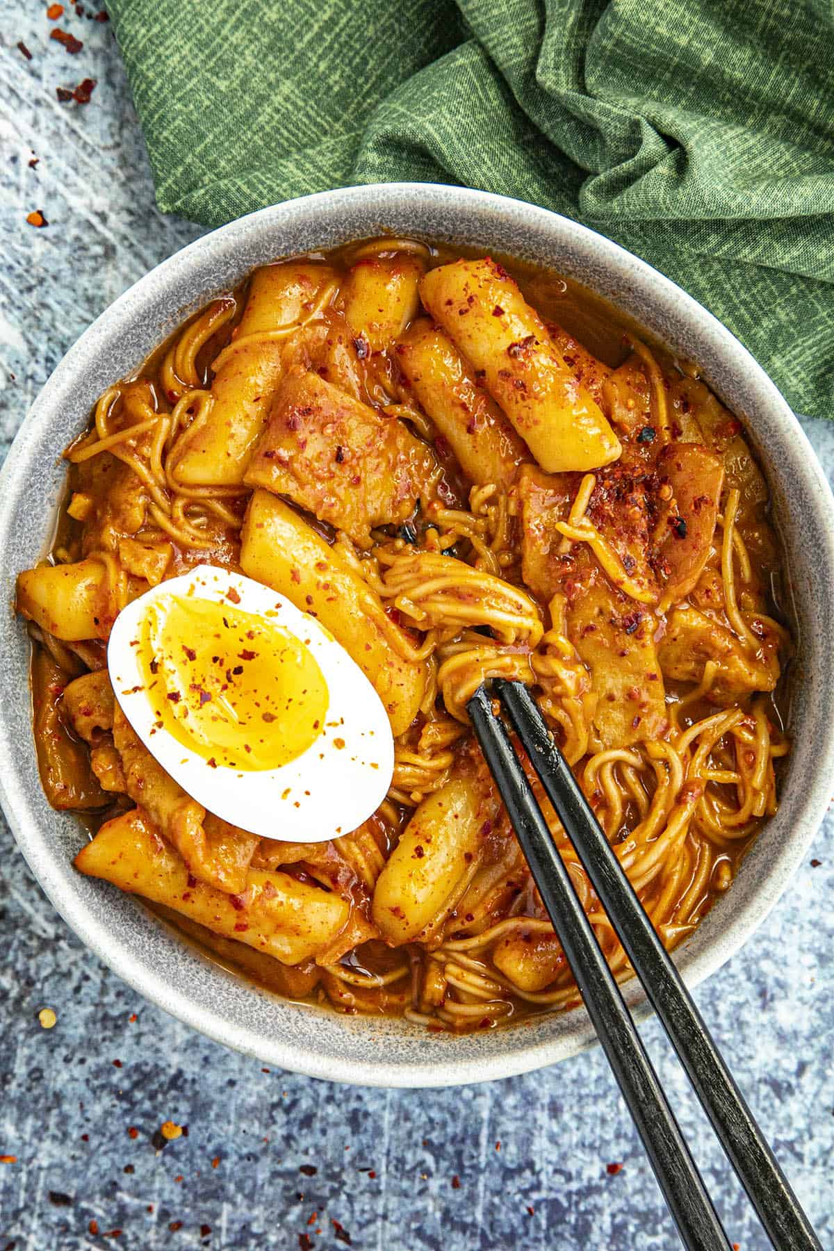 Korean Ramen with Rice Cakes (Rabokki) in a bowl with chopsticks