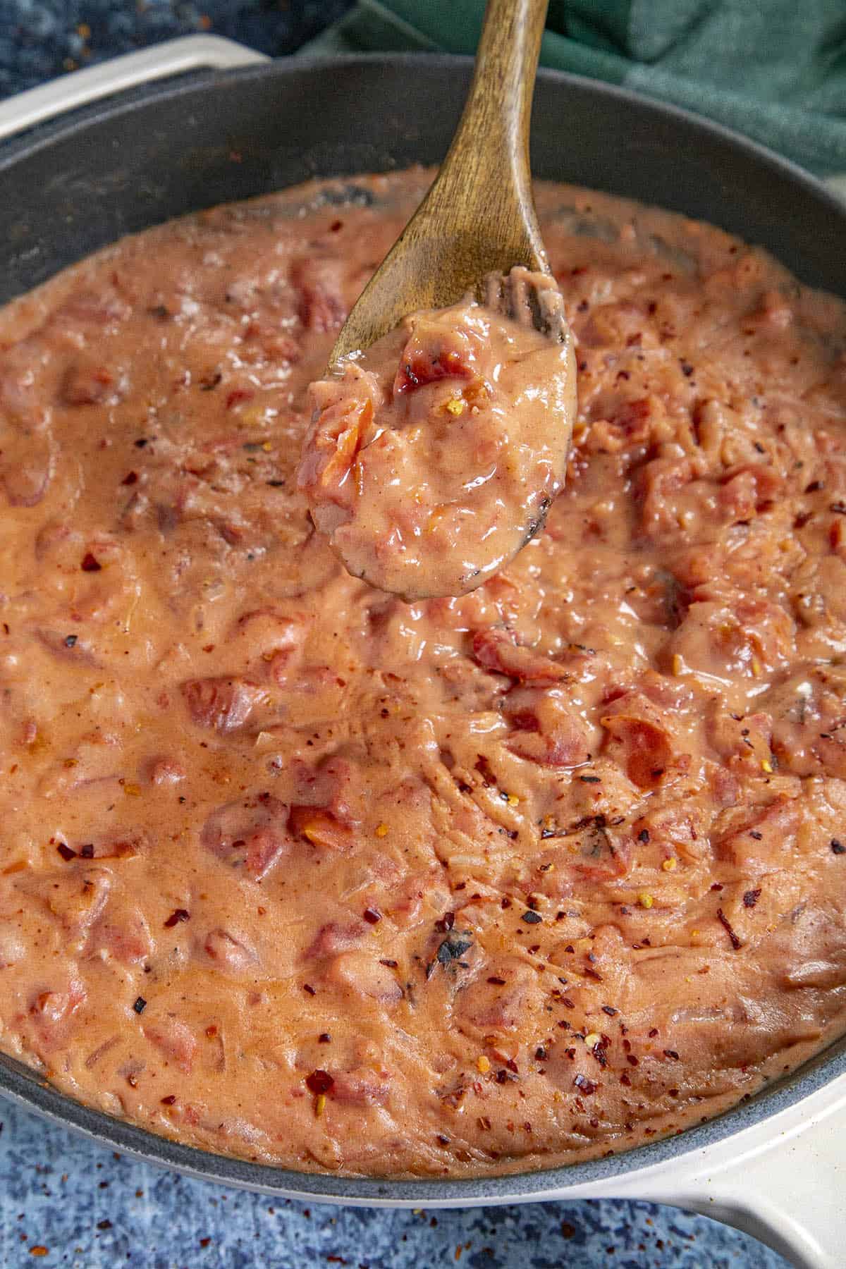 Mike serving tomato gravy from the pan