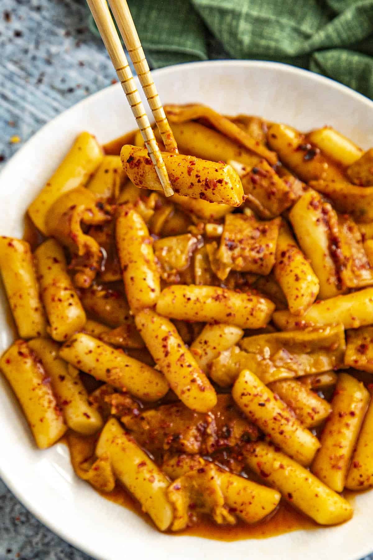 Tteokbokki in a bowl with chopsticks