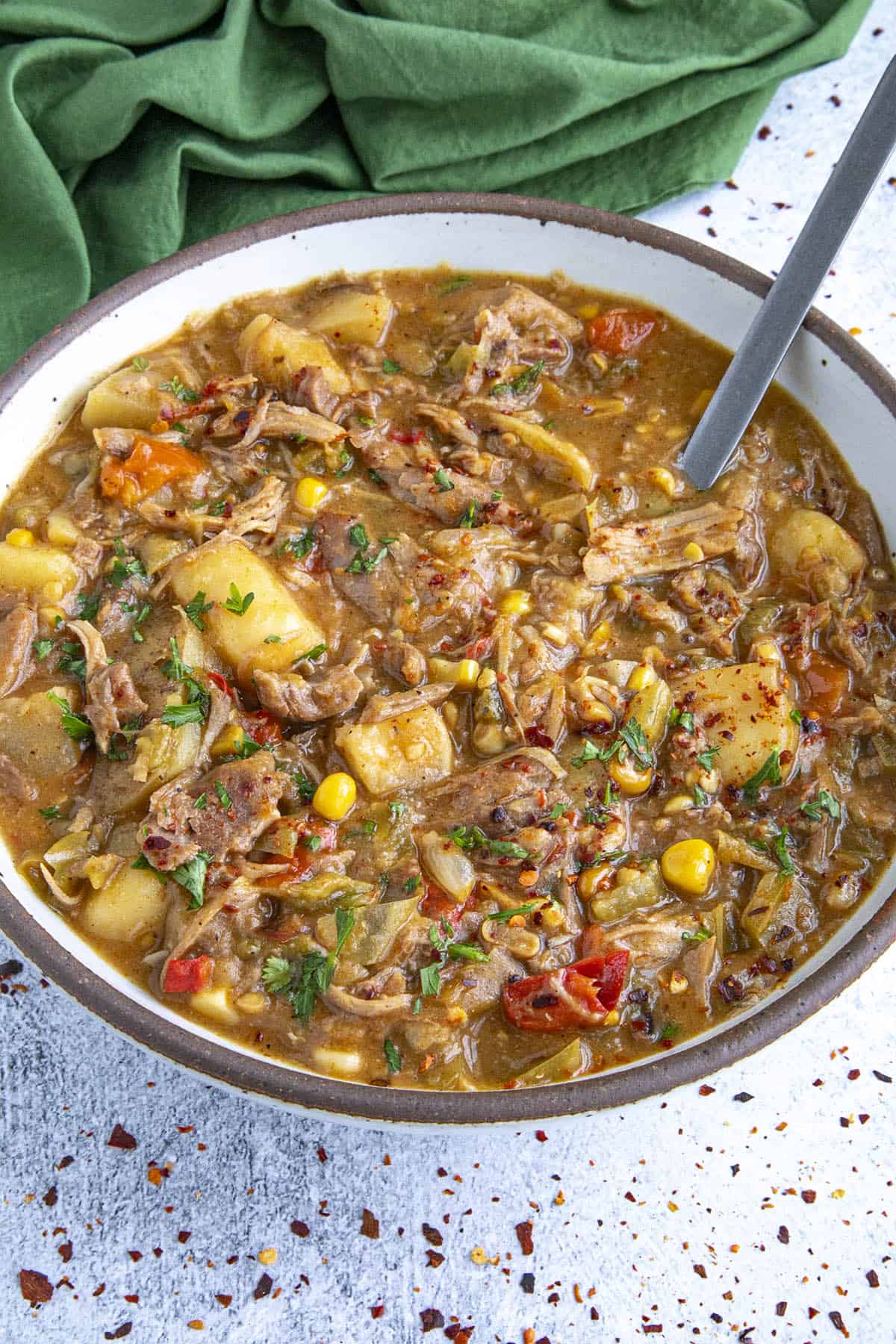 Hearty Turkey Stew in a bowl with lots of potatoes and vegetables