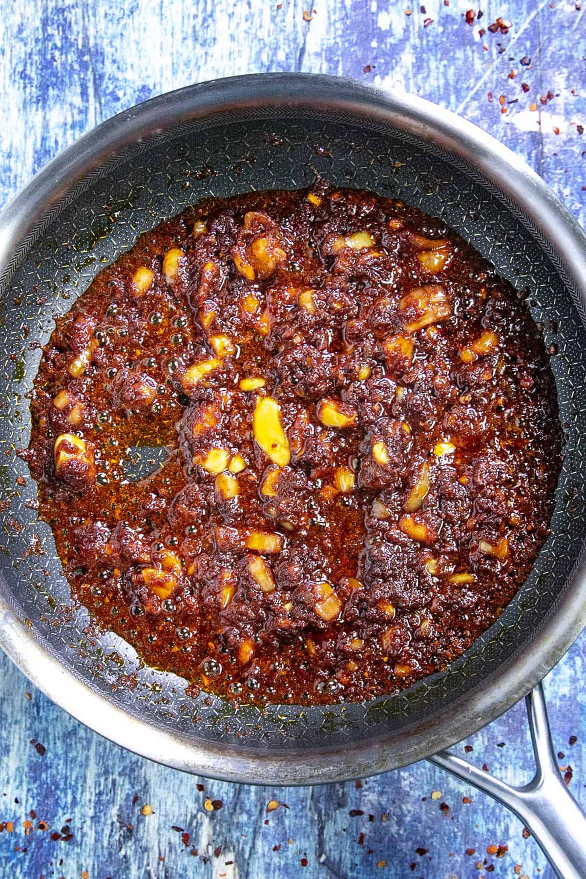 The spicy chili paste in a pan for making Bun Bo Hue (Spicy Vietnamese Noodle Soup)