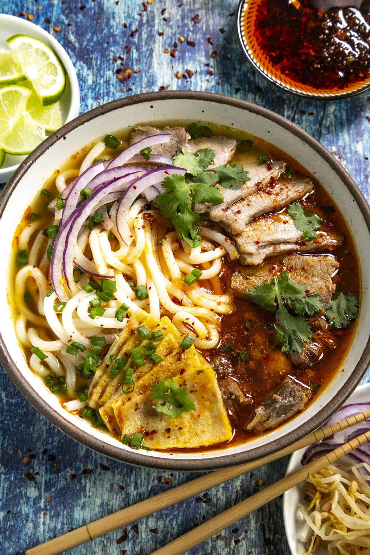 A bowl of Bun Bo Hue (Spicy Vietnamese Noodle Soup)