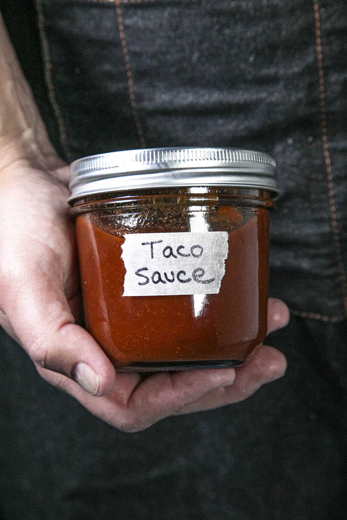 A jar of taco sauce