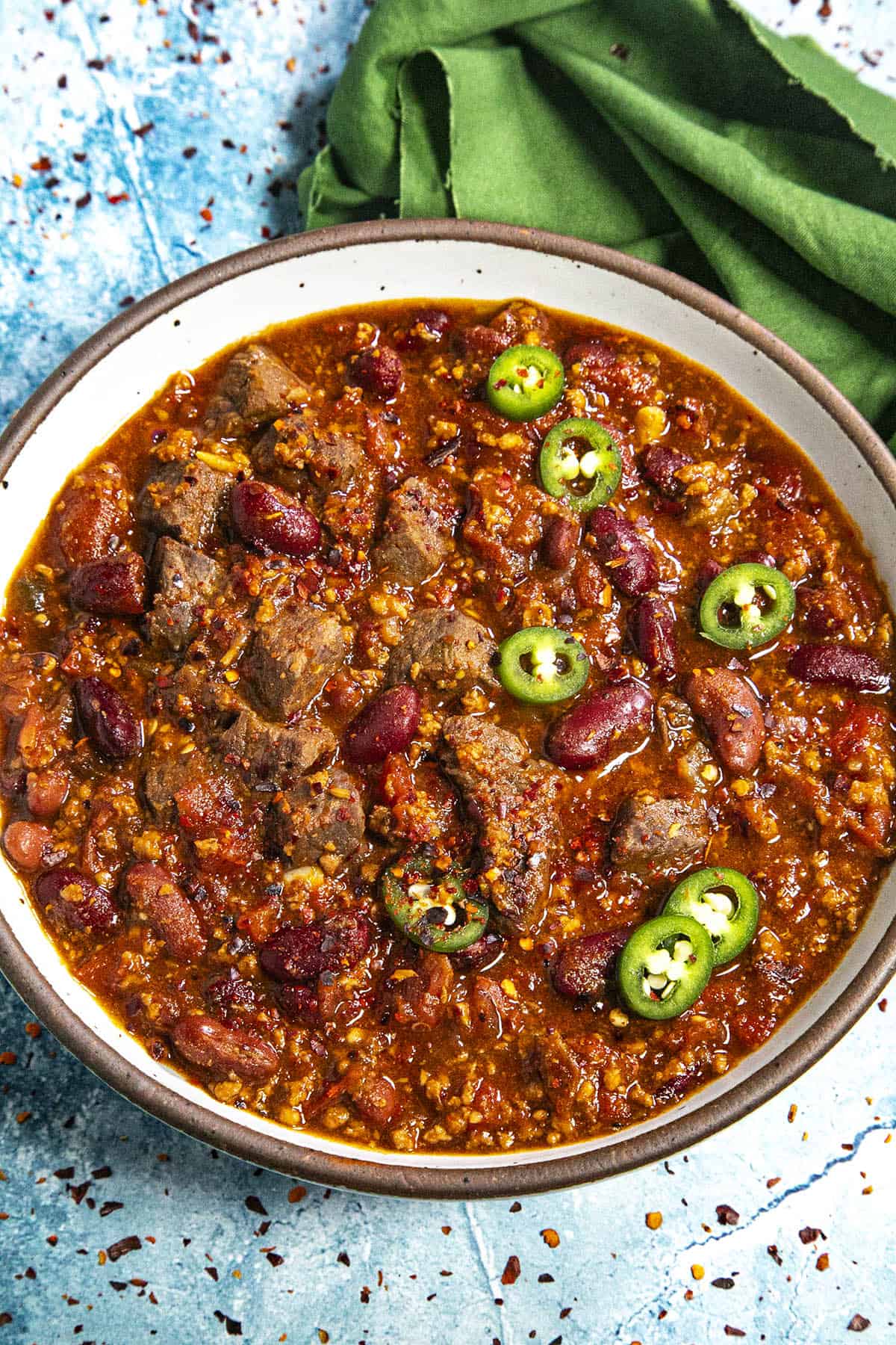 Short Rib and Chorizo Chili in a bowl with garnish