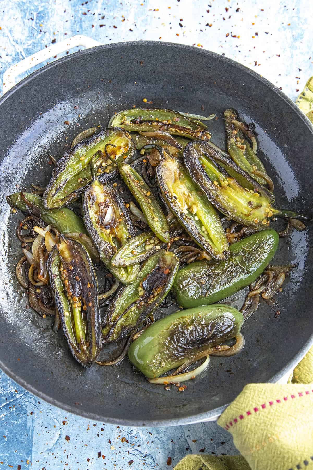 Chiles Toreados (Mexican Blistered Peppers) in a hot pan