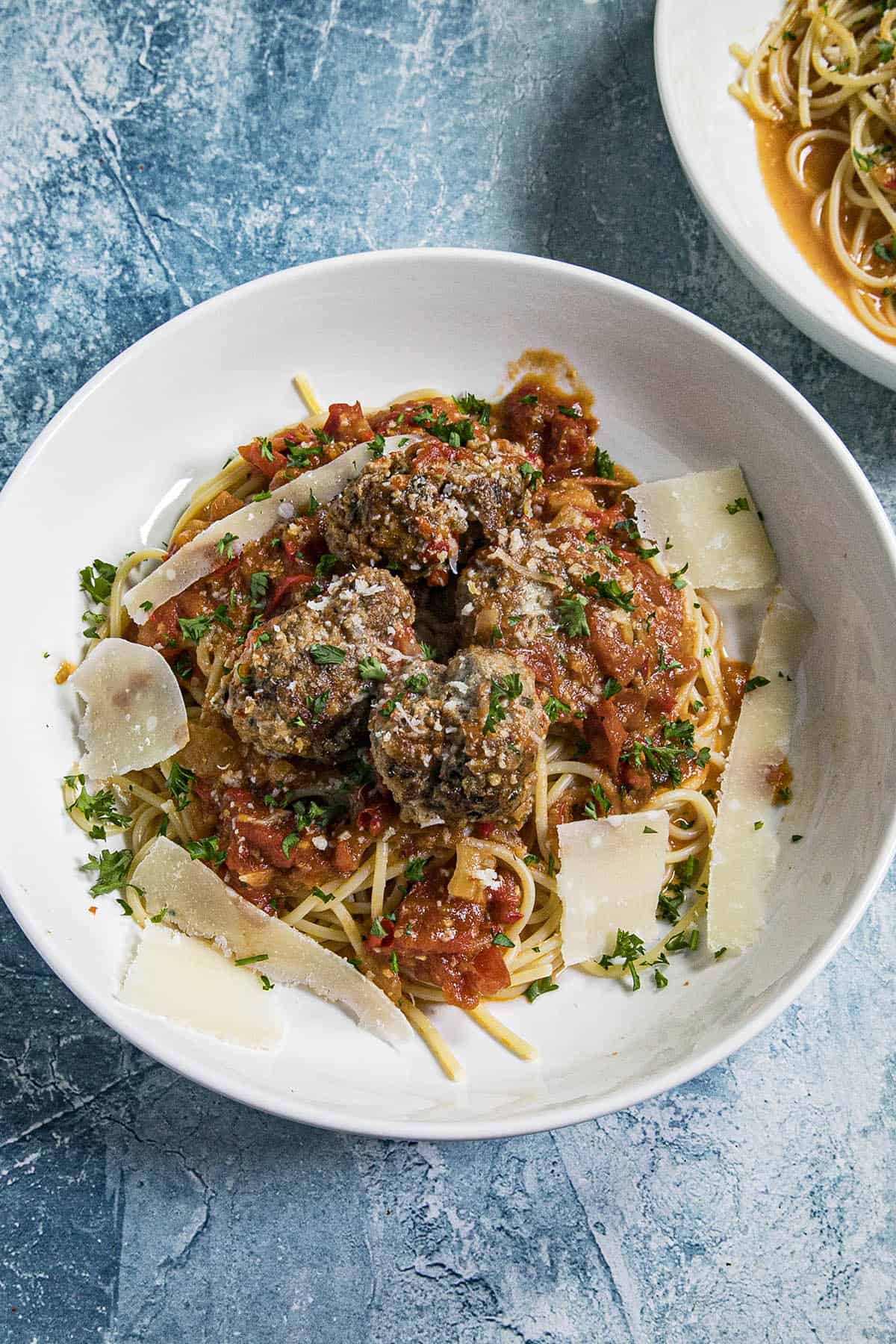Spicy Italian Meatballs served with spaghetti, spicy marinara, and lots of parmesan cheese
