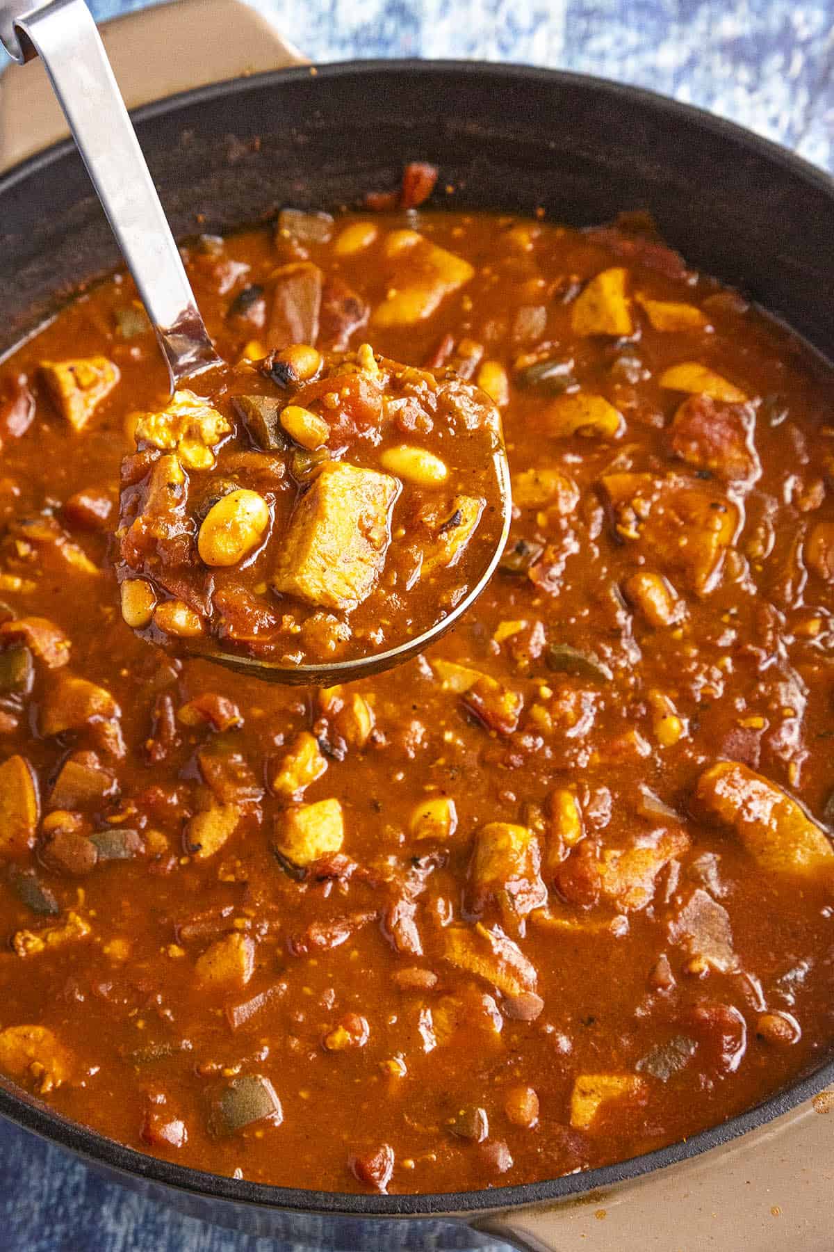 Serving a big scoop of Buffalo Chicken Chili from the pot