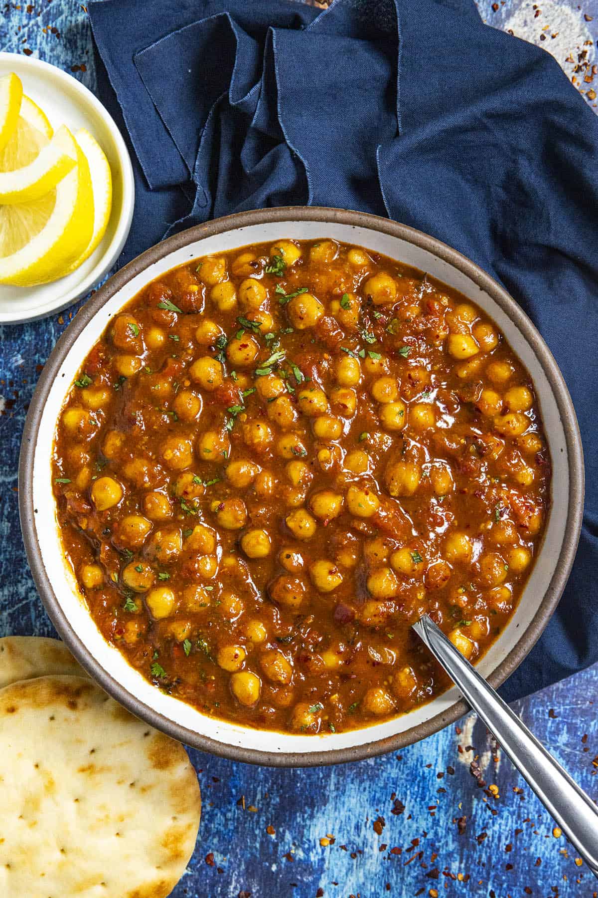 Chana Masala served in a bowl with garnish