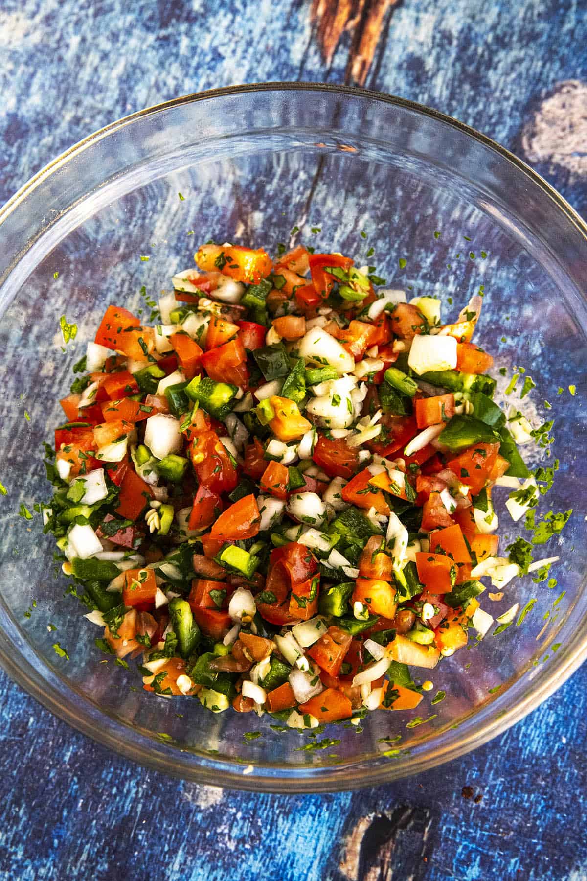 Pico de gallo in a bowl to top Mexican molletes