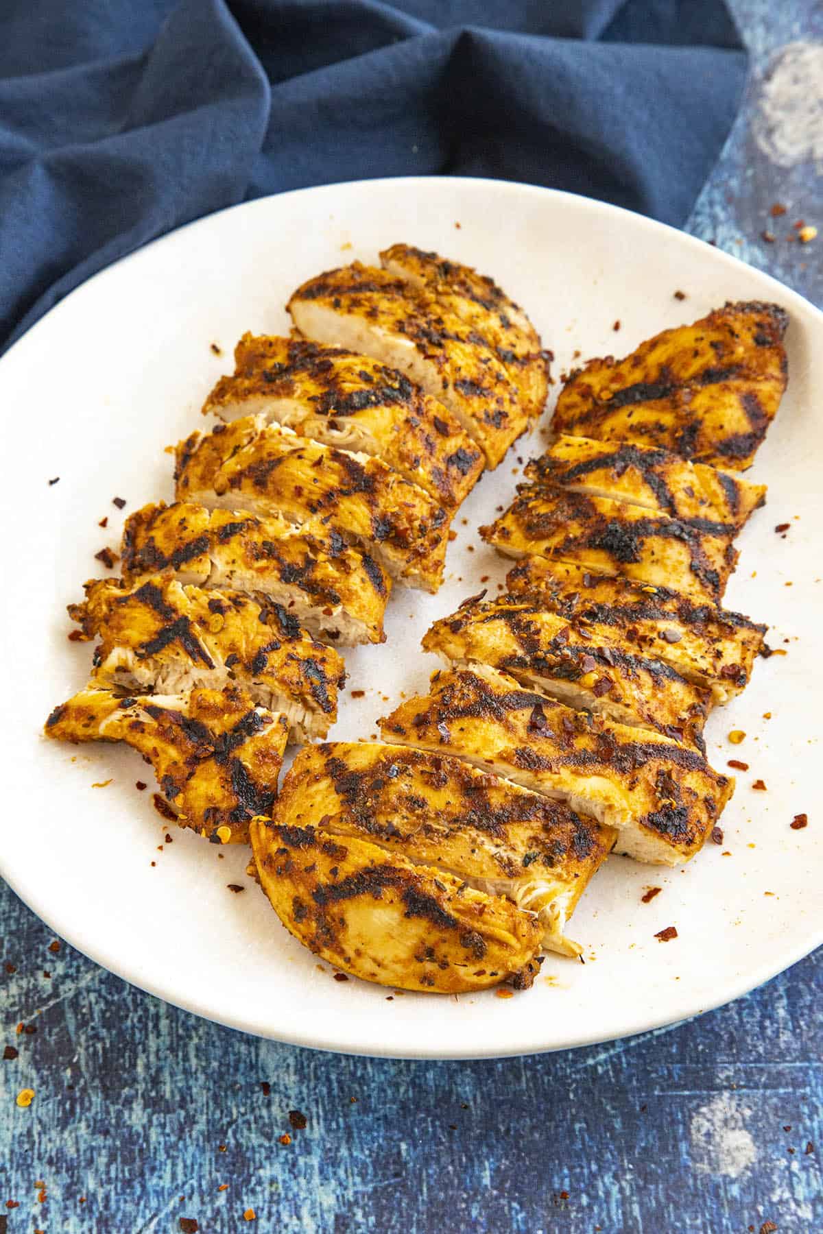 Sliced grilled chicken on a plate