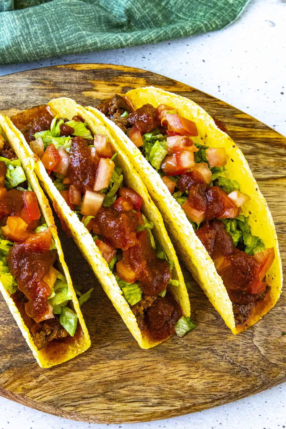 3 hard shell tacos topped with taco sauce and fiery Habanero Pico de Gallo