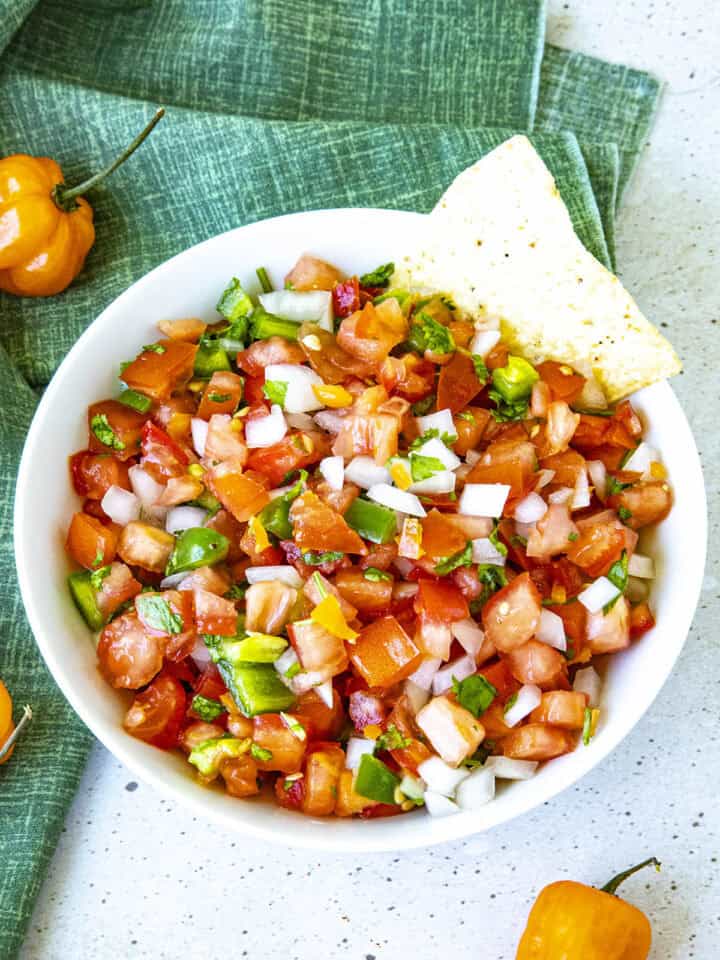 Habanero Pico de Gallo in a bowl with tortilla chips