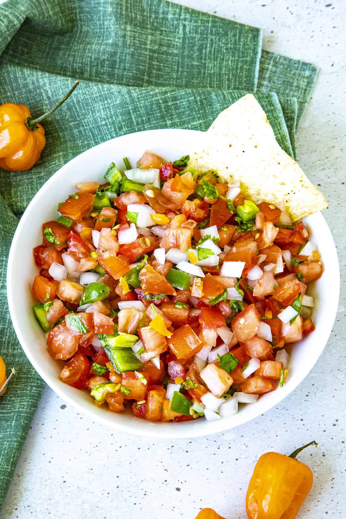 Habanero Pico de Gallo in a bowl with tortilla chips